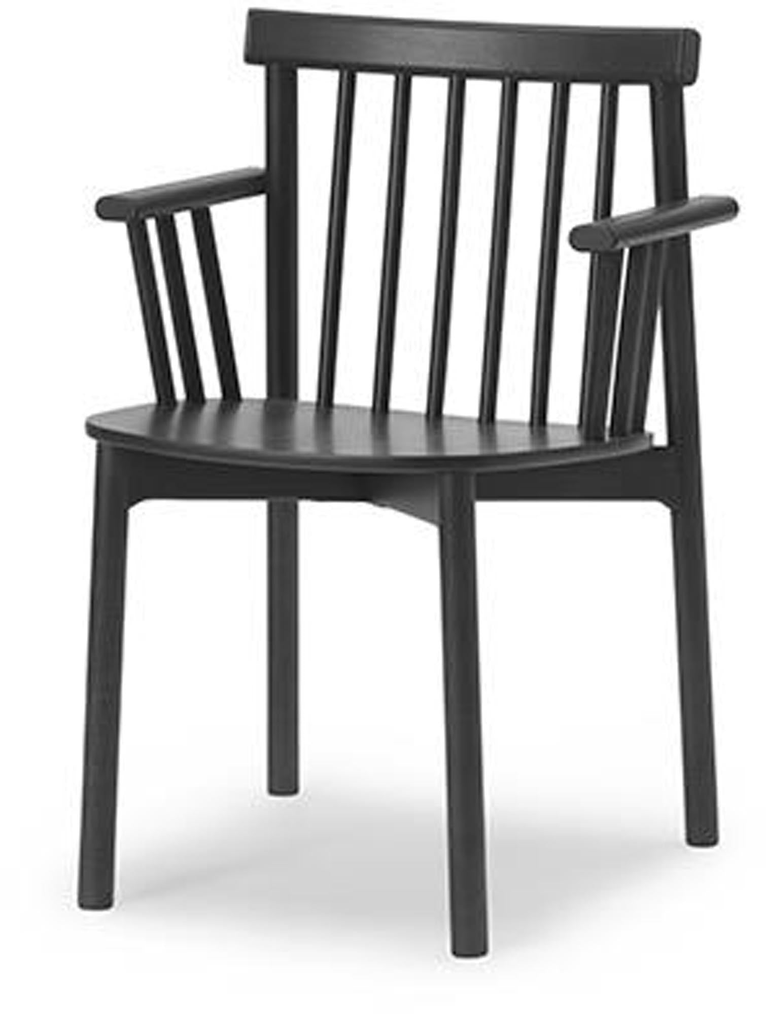 Der Pind Armlehnstuhl von Normann Copenhagen besticht durch sein zeitloses Design und hohen Sitzkomfort – ideal für stilvolle Wohnräume.