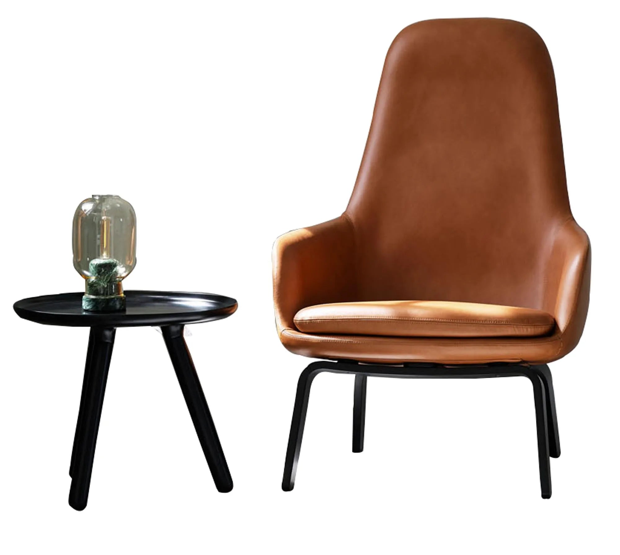 Der Era Lounge Sessel von Normann Copenhagen: Zeitloses, kurviges Design, hoher Komfort, individuell gestaltbar mit vielfältigen Stoff- und Lederoptionen.