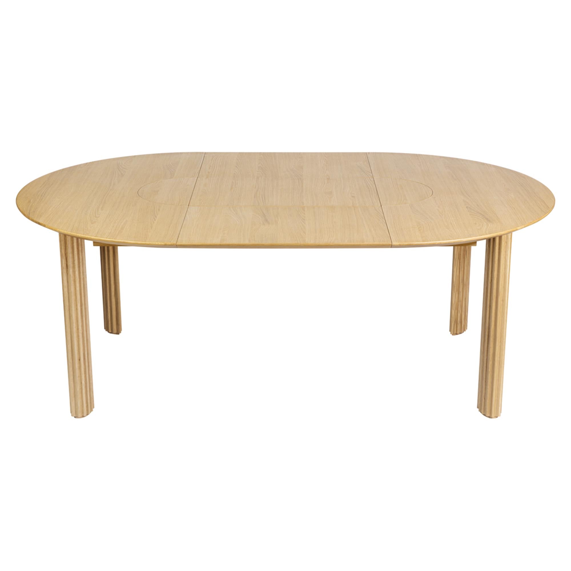 Stilvoller Umage Comfort Circle Tisch, erweiterbar für große Feiern.