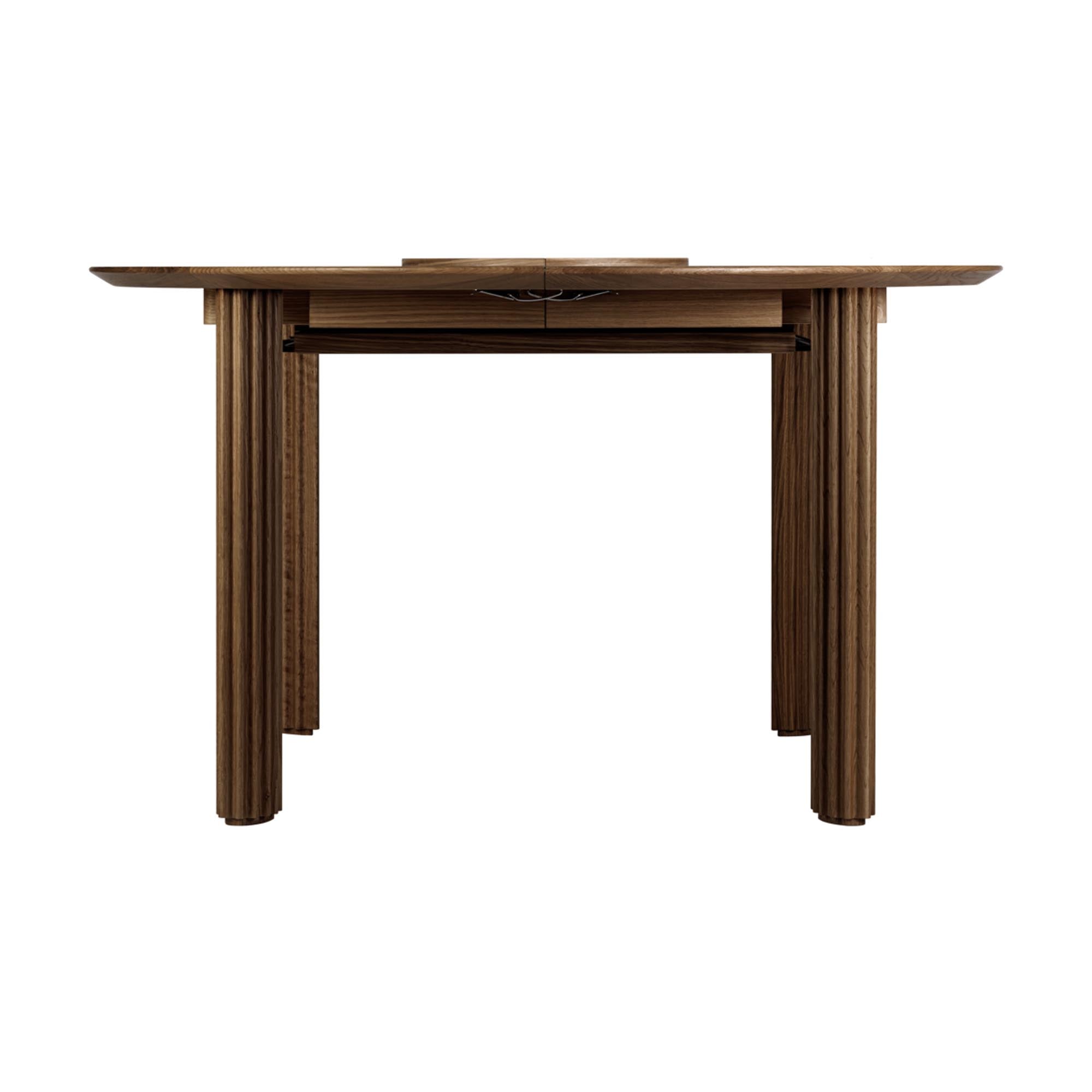 Stilvoller Umage Comfort Circle Tisch, erweiterbar für große Feiern.