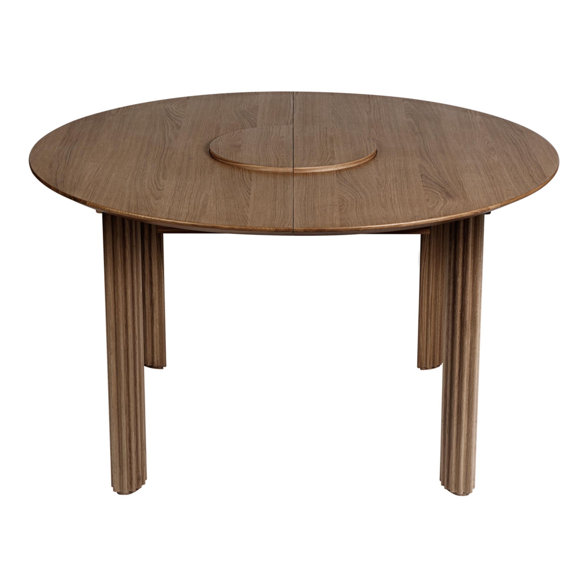 Stilvoller Umage Comfort Circle Tisch, erweiterbar für grosse Feiern.