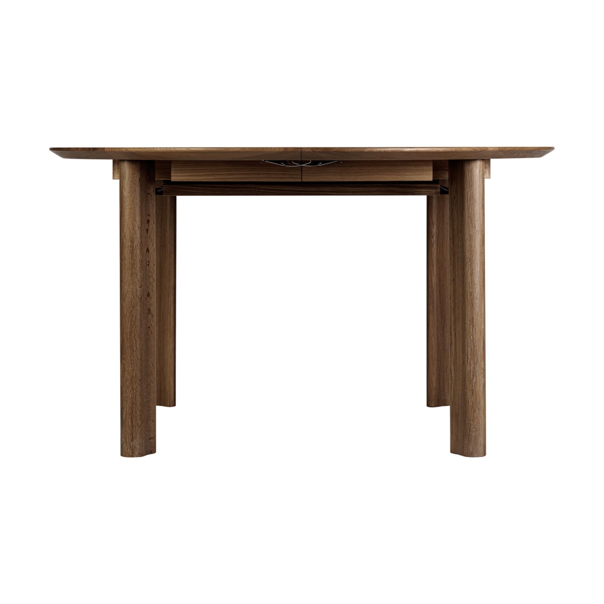 Stilvoller Umage Comfort Circle Tisch, erweiterbar für große Feiern.
