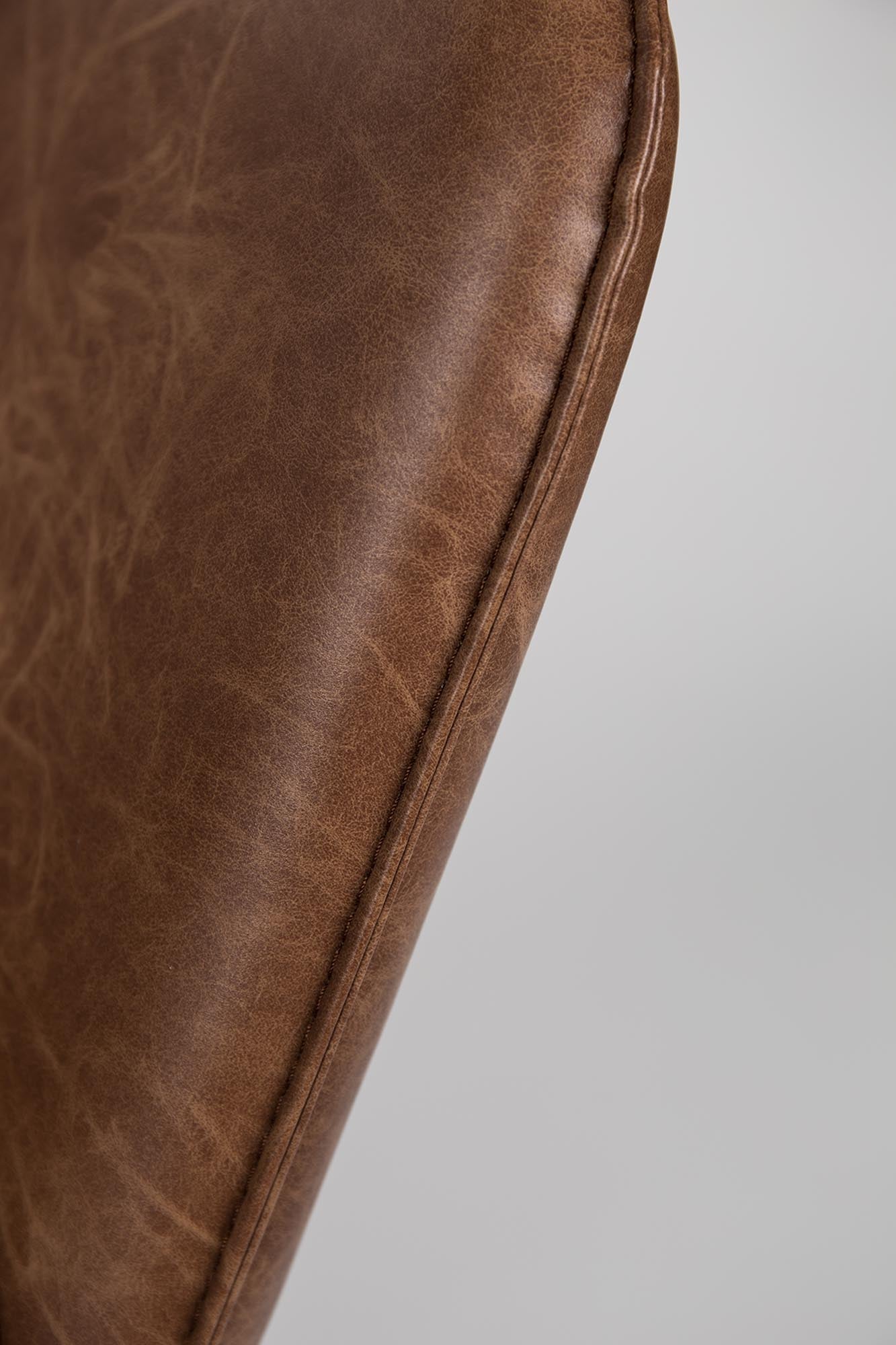 Eleganter Sessel BON von White Label Living in modernem Grau, perfekt für stilvolle Wohnräume und gemütliche Leseecken.