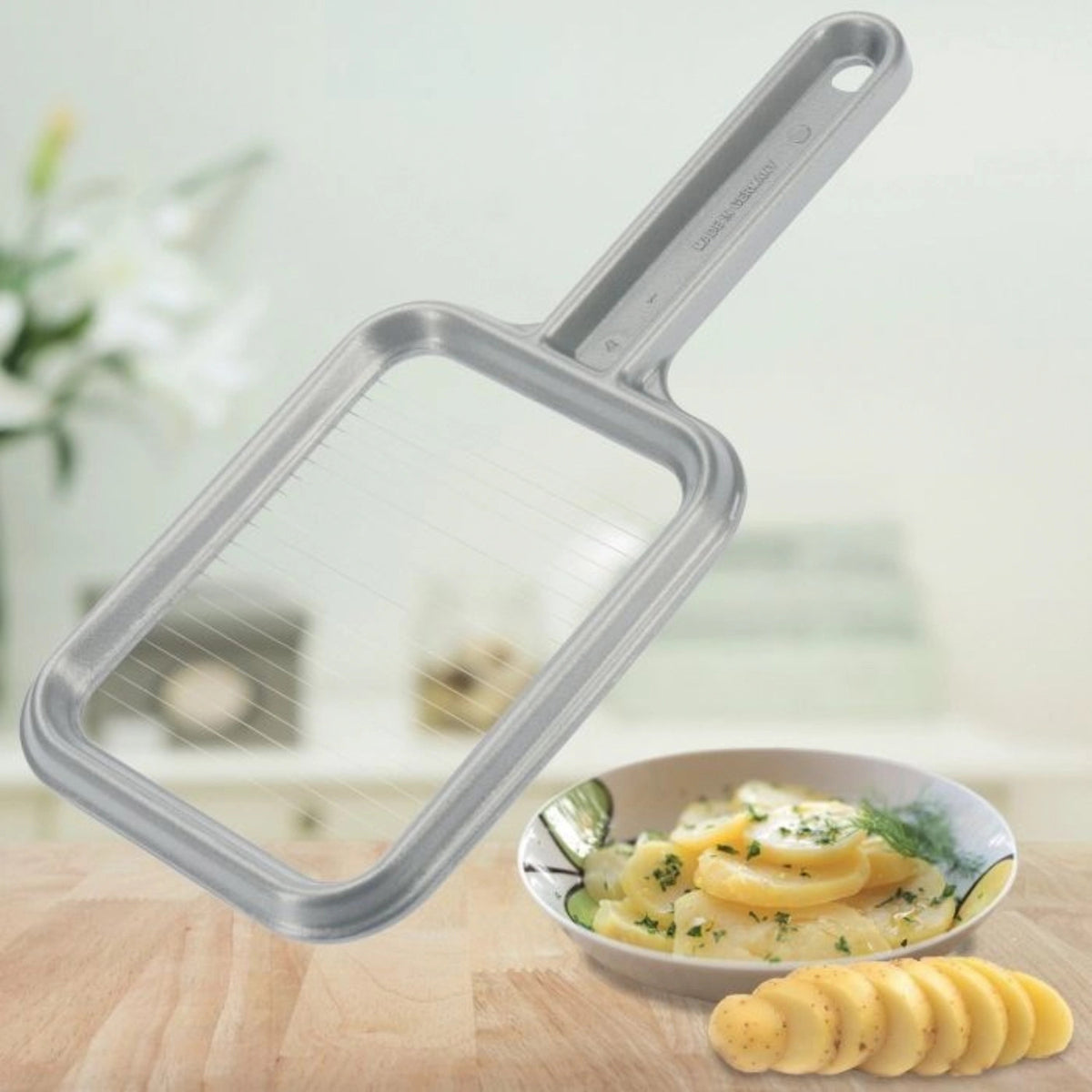 Pellkartoffel u. Mozzarellaschn. Rondex, 25.5x11.5x1.5cm in Grau präsentiert im Onlineshop von KAQTU Design AG. Küchenhelfer ist von Westmark