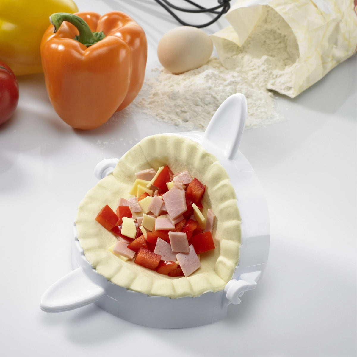 3-tlg. Set Maultaschen-/Ravioliformer in drei Grössen in Weiss präsentiert im Onlineshop von KAQTU Design AG. Backform / Backblech ist von Westmark