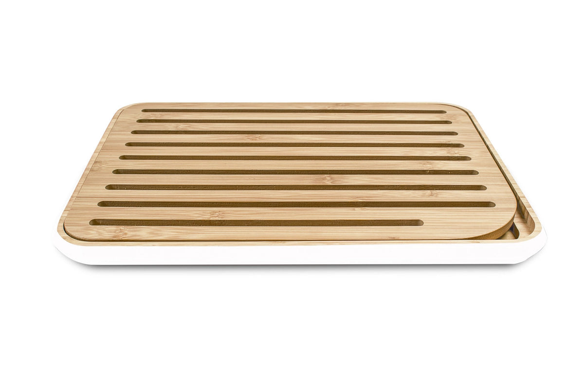 Pebbly Brotschneidebrett, weiss, 25x35cm in Braun präsentiert im Onlineshop von KAQTU Design AG. Schneidbrett ist von Pebbly