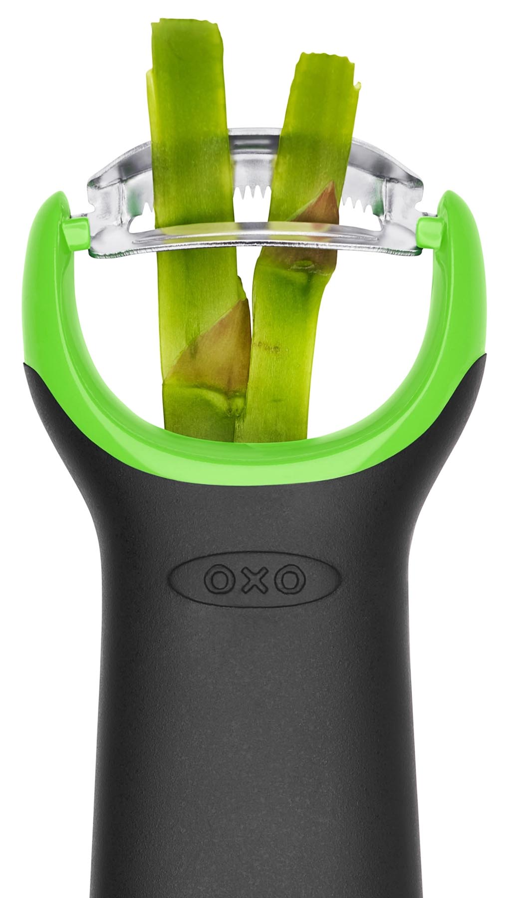 Der OXO GG Spargel Schäler in frischem Grün, ideal für müheloses Schälen von Spargel und anderen Gemüsesorten.
