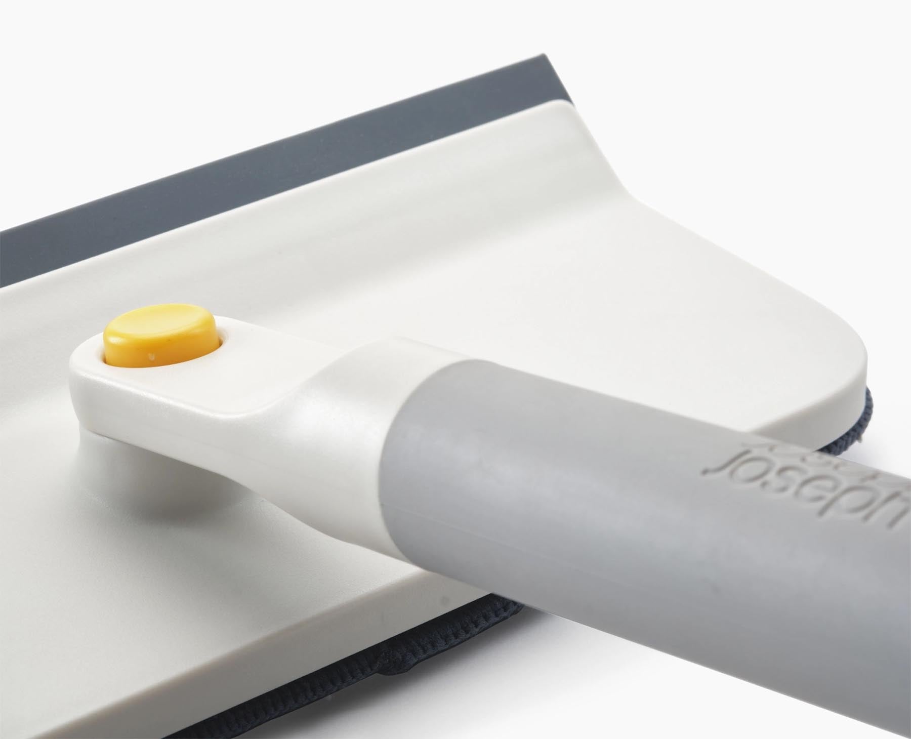 Praktischer CleanTech 2-in-1 Abzieher in elegantem Lichtstein-Grau, ideal für effiziente Reinigung und Pflege von Textilien.