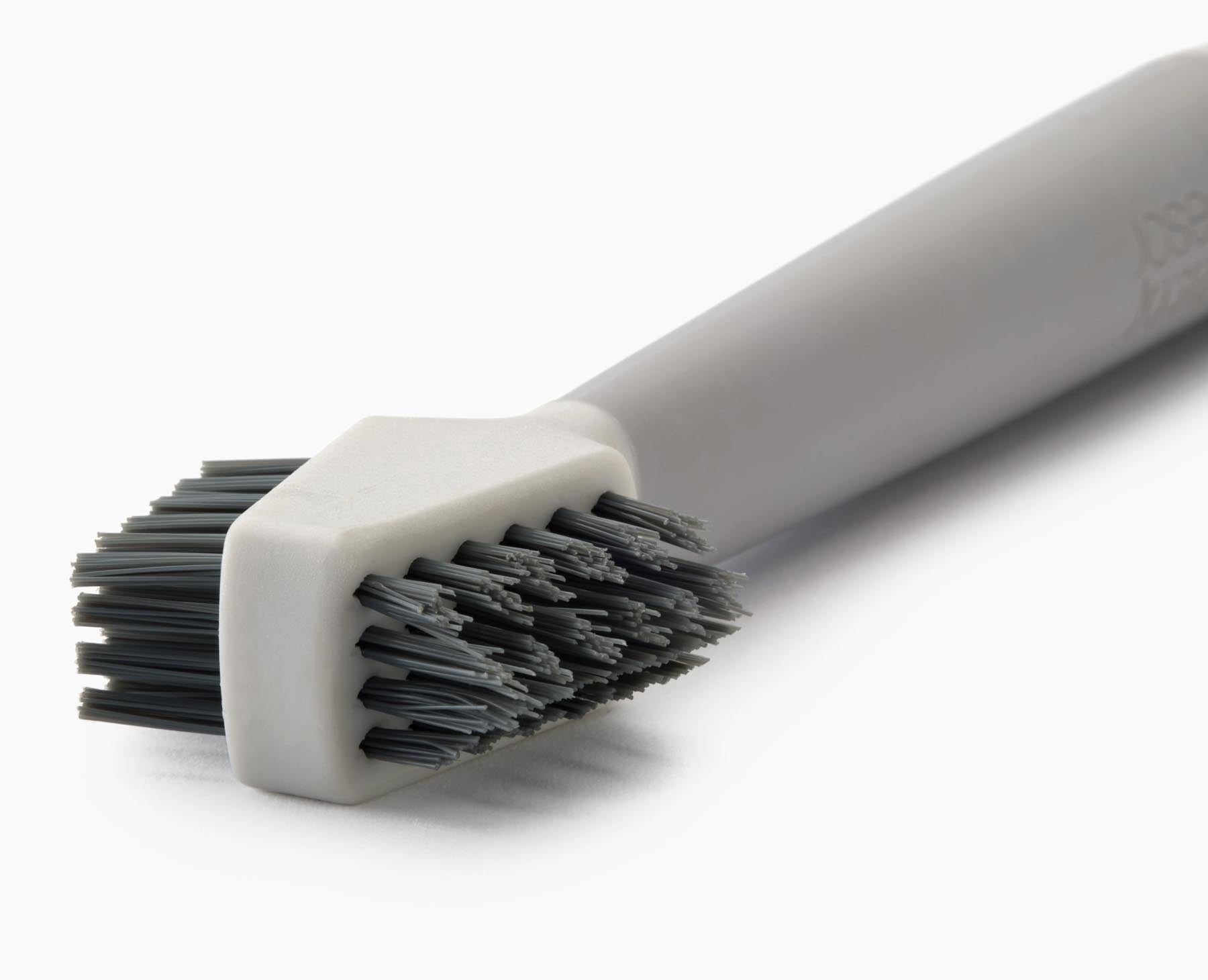 Vielseitige CleanTech 3-in-1 Reinigungsbürste in stilvollem Lichtstein, perfekt für effektive Reinigung von Geschirr und Küchenoberflächen.