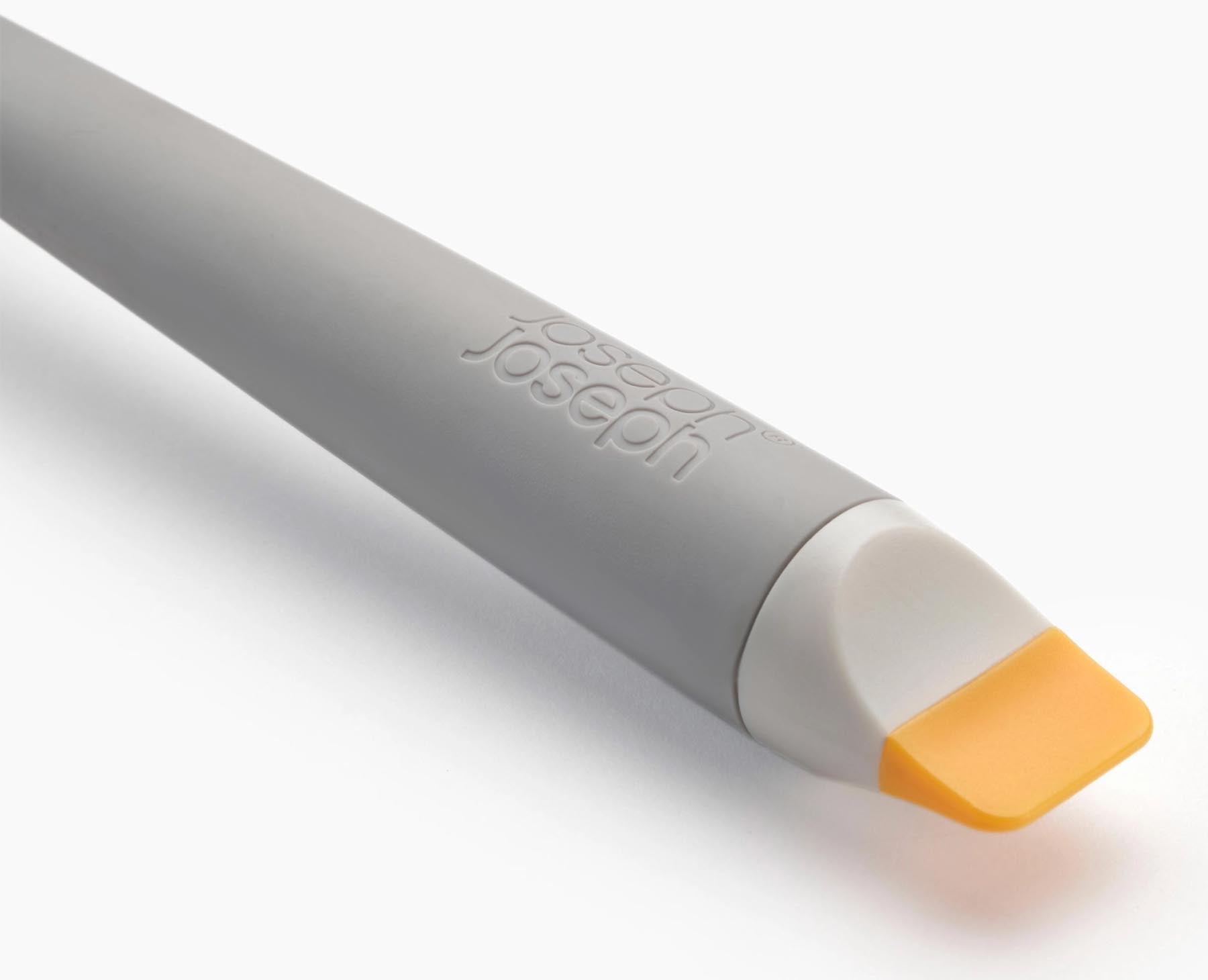Praktische CleanTech 3-in-1 Reinigungsbürste in elegantem Lichtstein, ideal für gründliche Reinigung von Geschirr und Oberflächen.