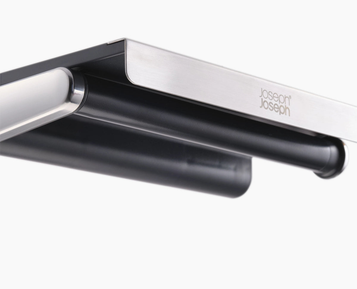 RollGrip Küchenrollenhalter für Unterablage ausziehbar in Schwarz präsentiert im Onlineshop von KAQTU Design AG. Papierrollenhalter ist von Joseph Joseph