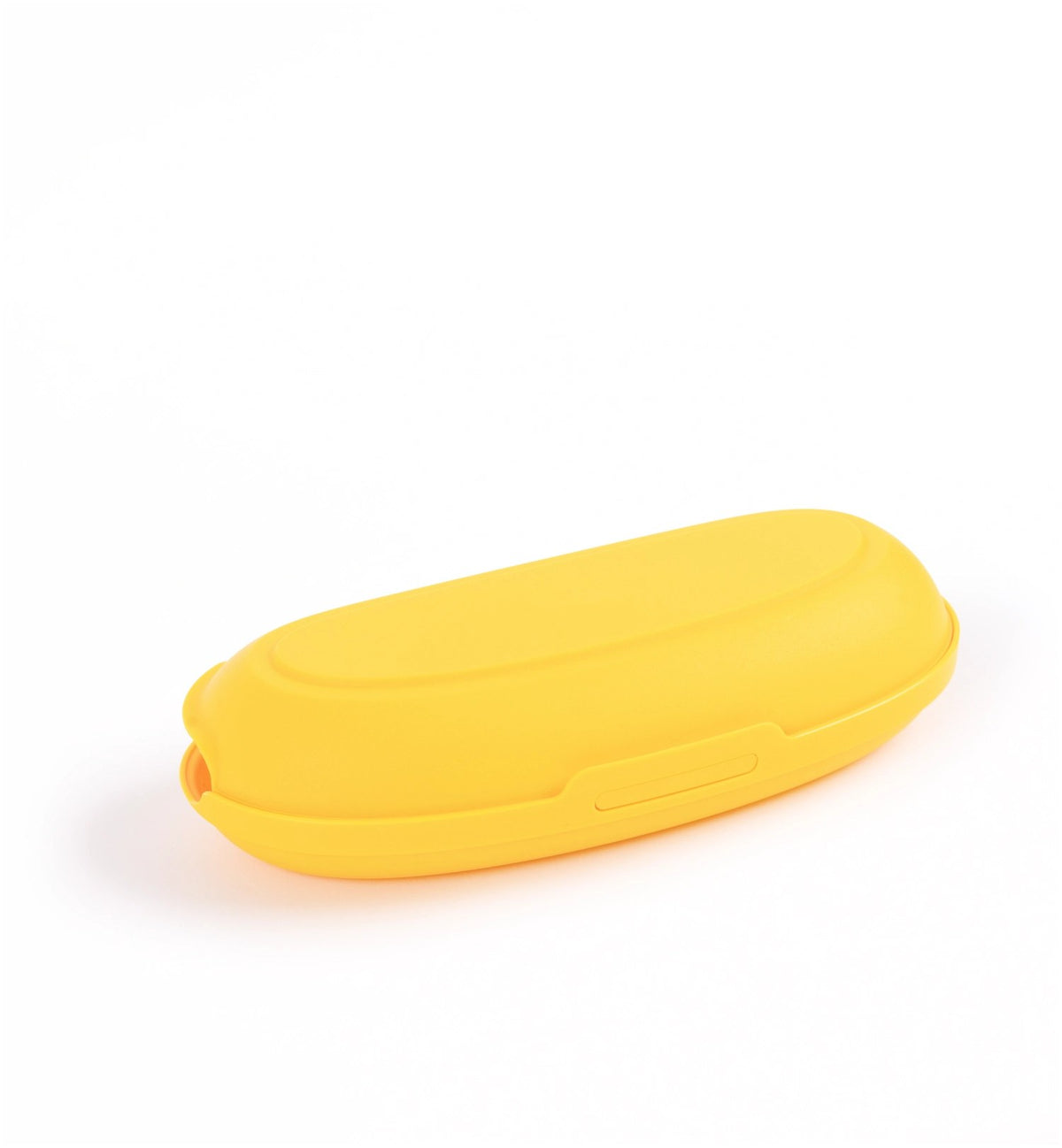 Gelbe Bananenbox von Day To Day mit ovaler, geschwungener Form, passend für eine Banane, Grösse 22 x 9 x 5.5 cm, aus Kunststoff gefertigt.
