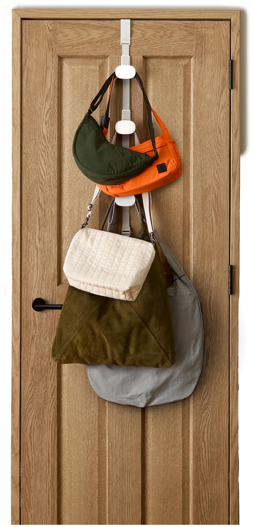 Stylischer ecru Taschenhalter für Türrahmen von Joseph Joseph, ideal zur Aufbewahrung von Taschen und Accessoires im Haushalt.
