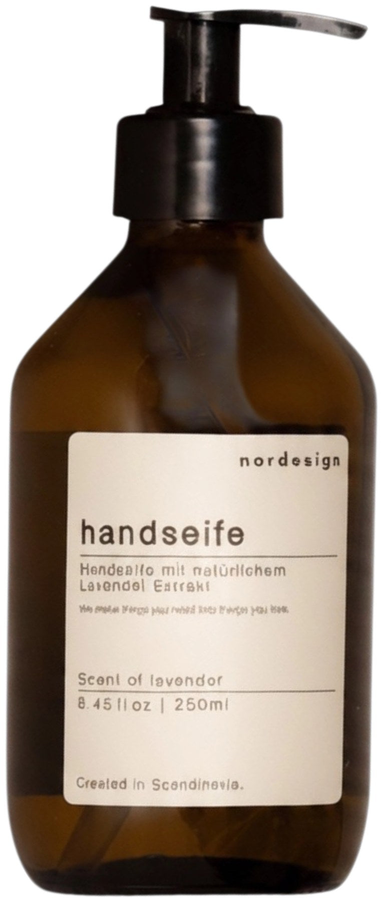 Handseife 250ml lavender & sage von Nordesign in Braun, schmale Flaschenform mit 6 x 6 x 18 cm, stehend auf einer Ablage.