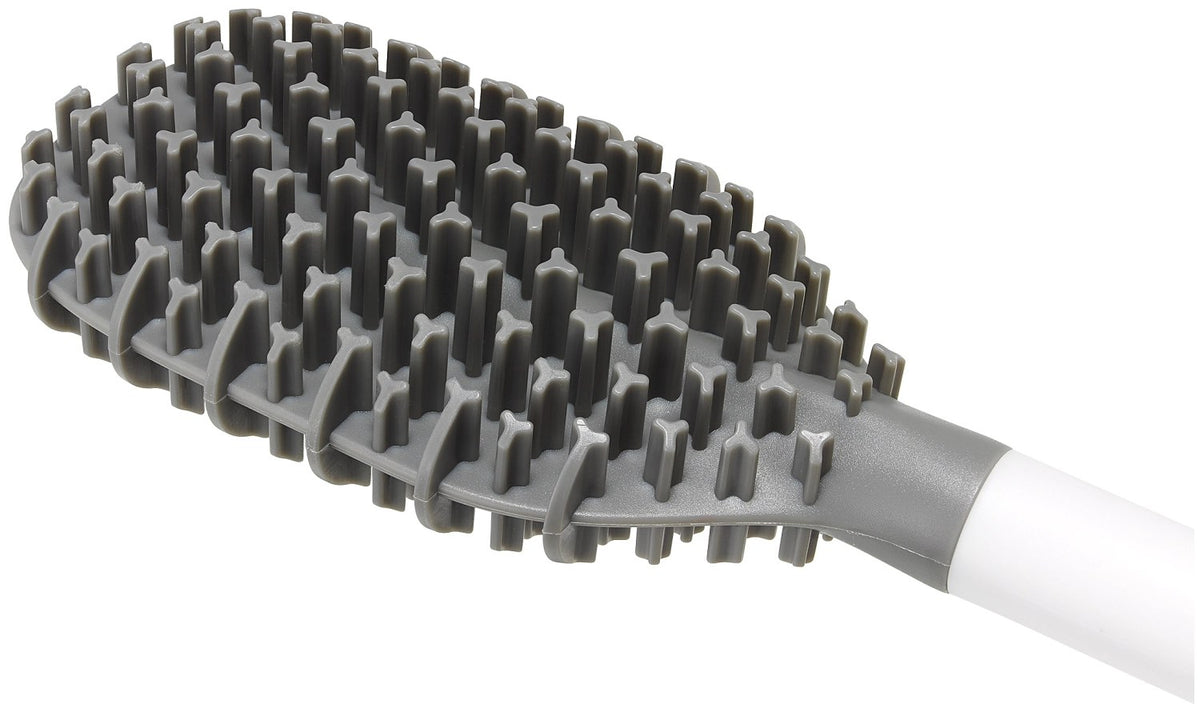 Weisse WC-Bürste Flex TriBlade von Joseph Joseph mit passendem geschlossenem Halter, schlanke Form, glänzende Oberfläche, freistehend im Badezimmer.