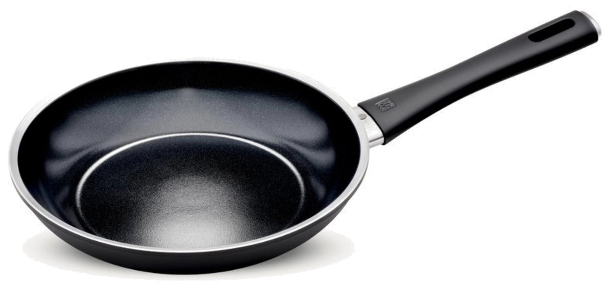 Schwarze Aluminium-Bratpfanne mit 24cm Durchmesser, Keramikbeschichtung, Temperaturindikator in der Pfannenmitte und flachem Induktionsboden.