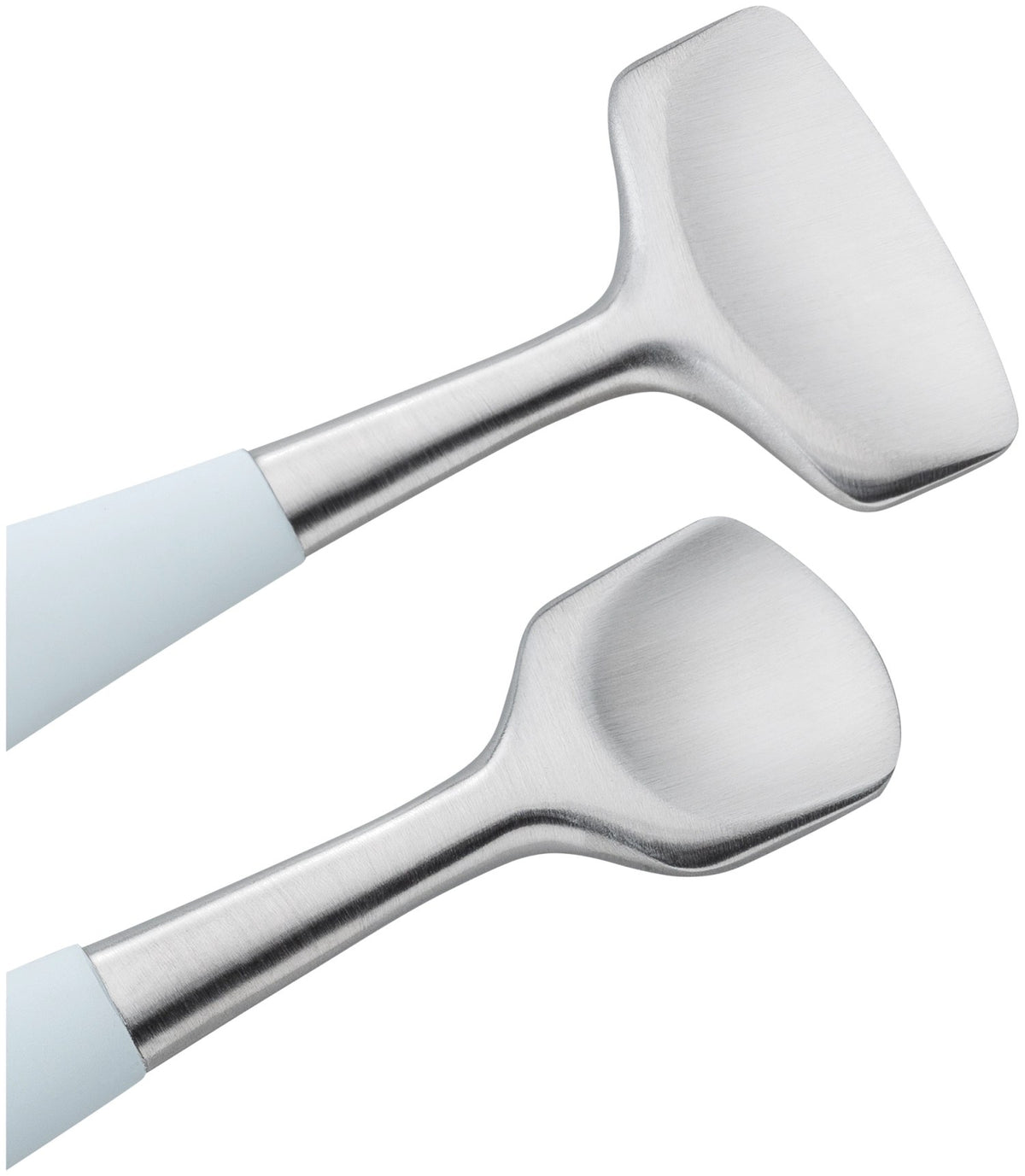 Silberfarbenes Facial Pore Refiner Tool aus Edelstahl mit zwei funktionalen Enden für die Gesichtspflege, liegend fotografiert.