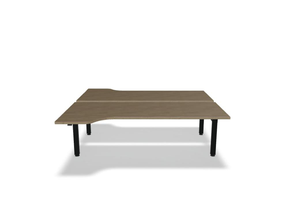 Doppelschreibtisch Ogi Drive Bench in Honigeiche mit schwarzem Metallgestell, zwei Teleskopsäulen und Bedienfeldern für Höhenverstellung.