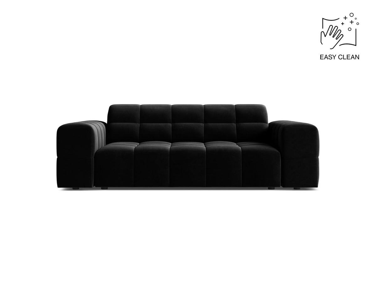 Beiges 2er Sofa Jennifer von Micadoni mit Chenille-Bezug, schwarzen Kunststoffbeinen und gepolsterter Rückenlehne auf hellem Hintergrund fotografiert.