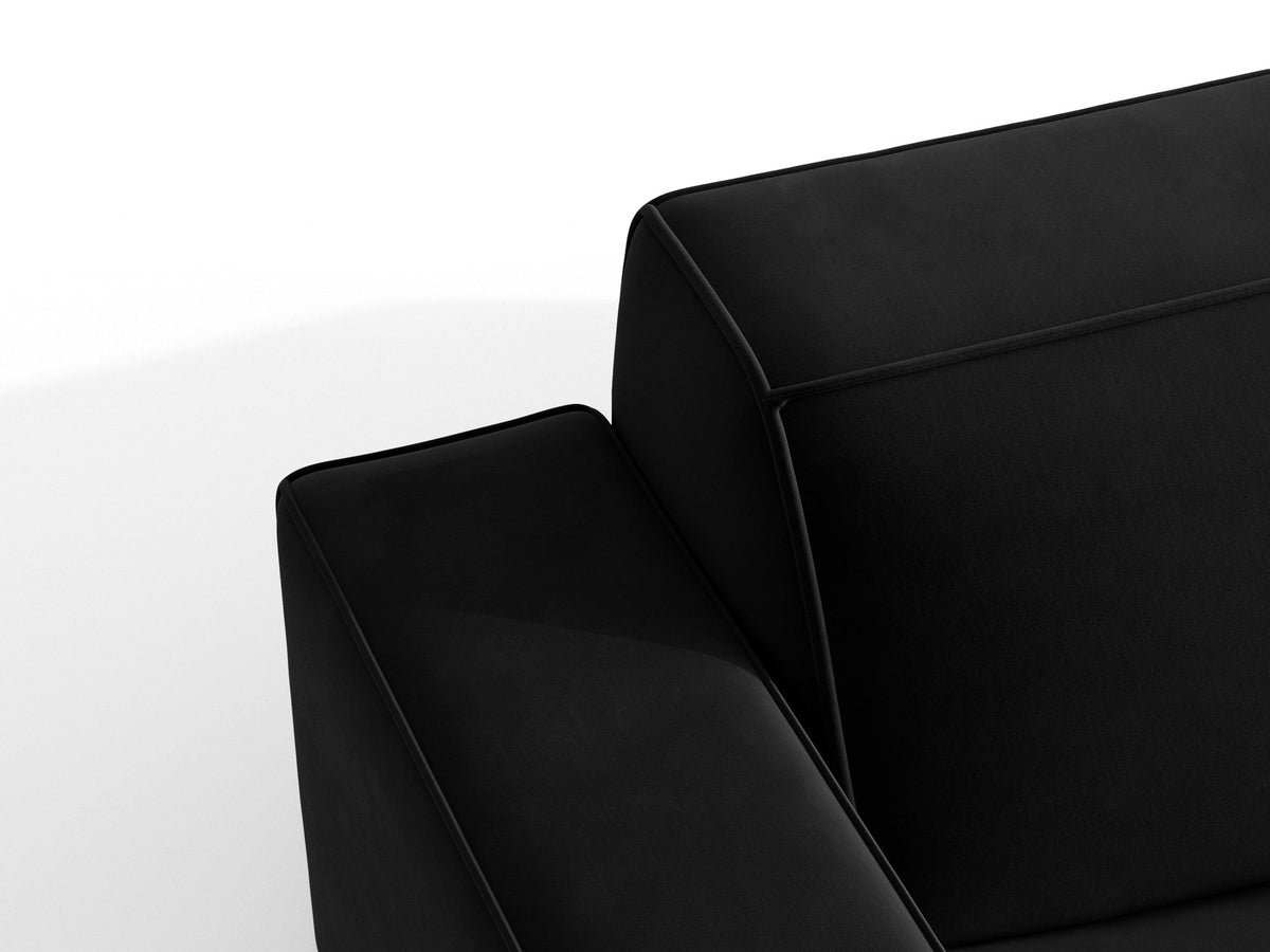 Zweisitzer-Sofa Jodie von Micadoni mit beigem Samtbezug, schwarzen Kunststoffbeinen und gepolsterter Rückenlehne, Frontalansicht.