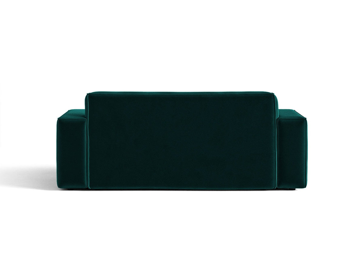 Zweisitzer-Sofa Jodie von Micadoni mit beigem Samtbezug, schwarzen Kunststoffbeinen und gepolsterter Rückenlehne, Frontalansicht.