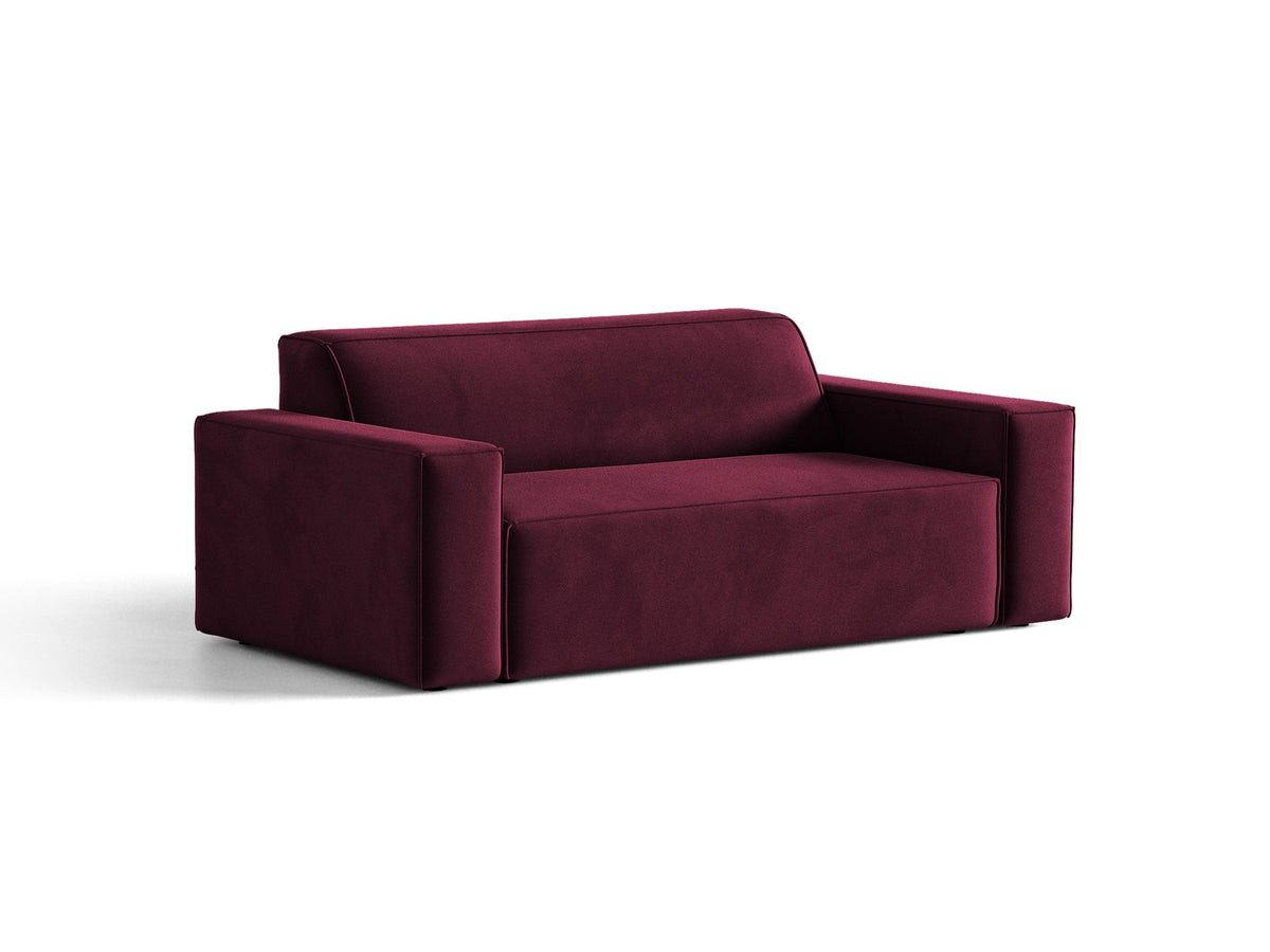 Zweisitzer-Sofa Jodie von Micadoni mit beigem Samtbezug, schwarzen Kunststoffbeinen und gepolsterter Rückenlehne, Frontalansicht.