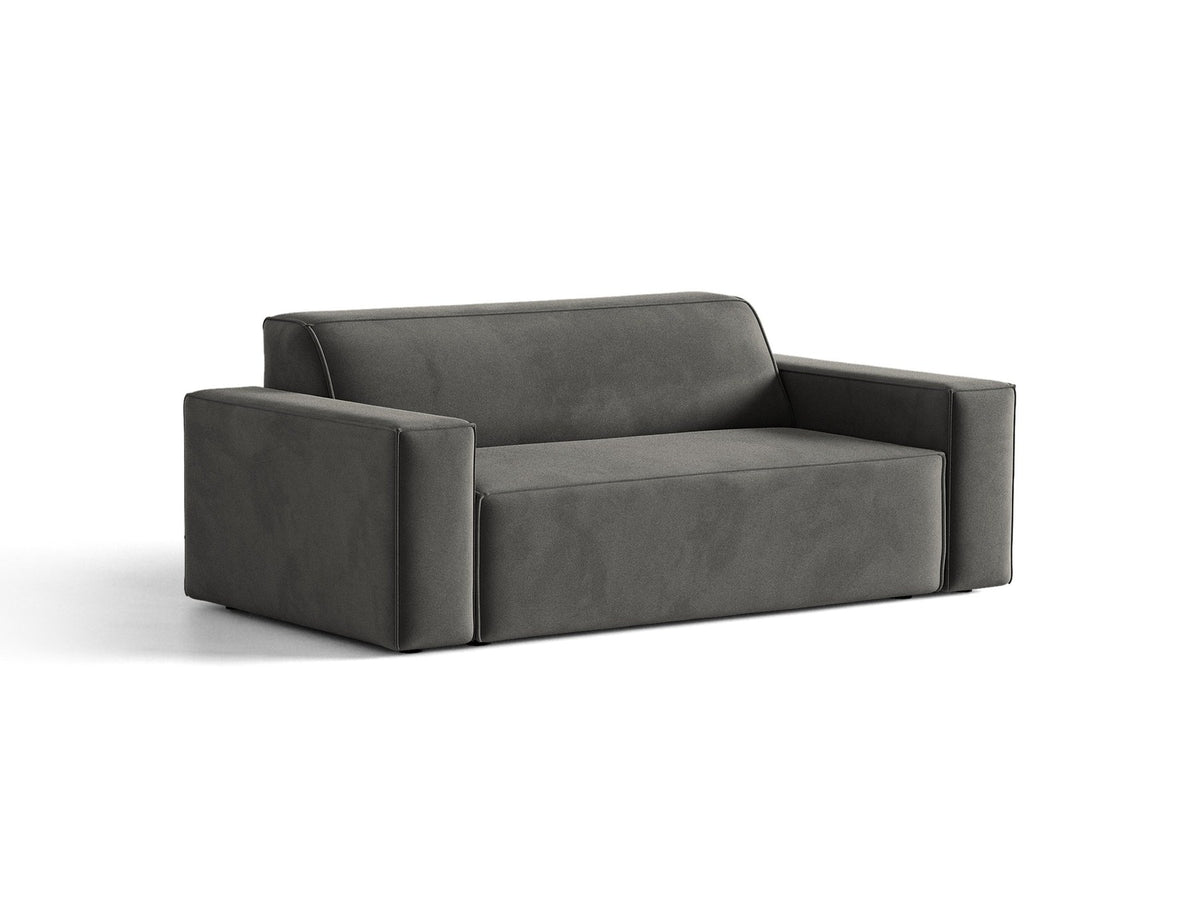 Zweisitzer-Sofa Jodie von Micadoni mit beigem Samtbezug, schwarzen Kunststoffbeinen und gepolsterter Rückenlehne, Frontalansicht.