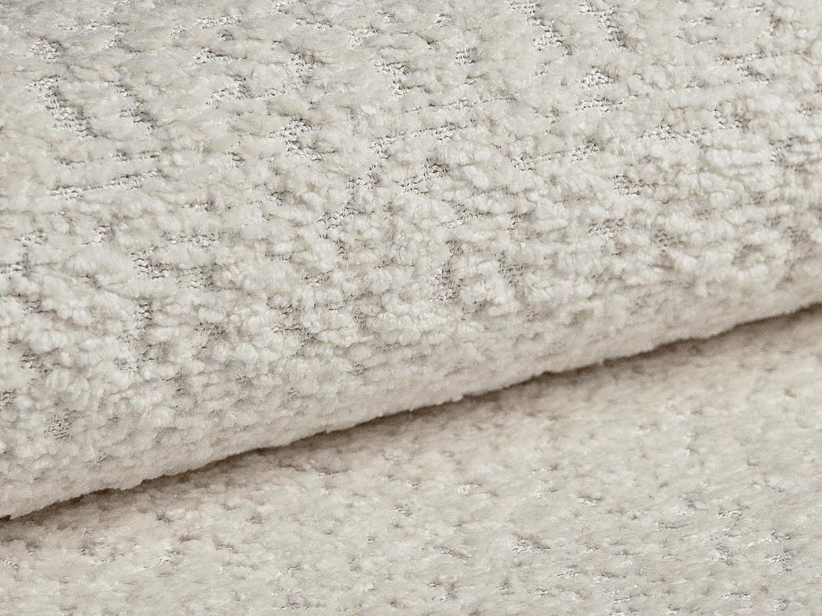 Entdecken Sie das elegante Ella Boucle Sofa von Micadoni: ein vielseitiges 3-Sitzer Sofa mit Schlaffunktion und cleverem Stauraum für Ihr modernes Zuhause.