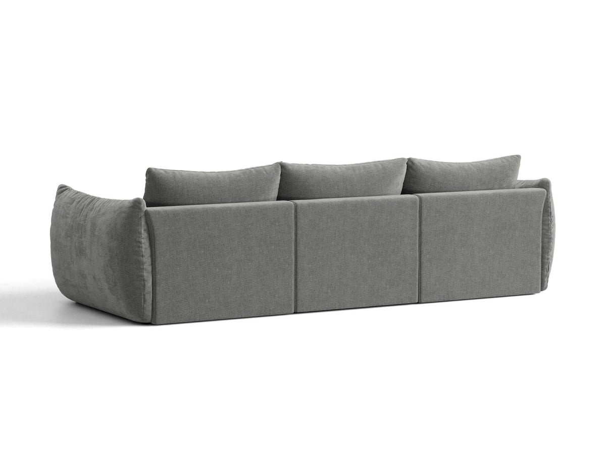 Modulares 4er Sofa Bloom von Micadoni in leichtem Beige, Bezug aus Casino-Velours, schwarze Kunststoffbeine, gepolsterte Rückenkissen.