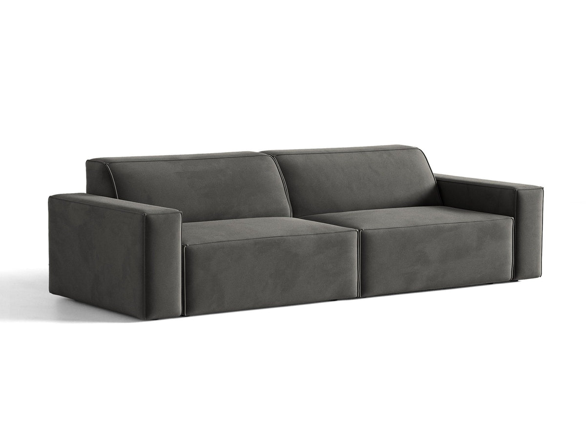 Modulares 4er Sofa Jodie von Micadoni in leichtem Beige mit Venus Samtstoff, schwarzen Kunststoffbeinen und niedriger Rückenlehne.