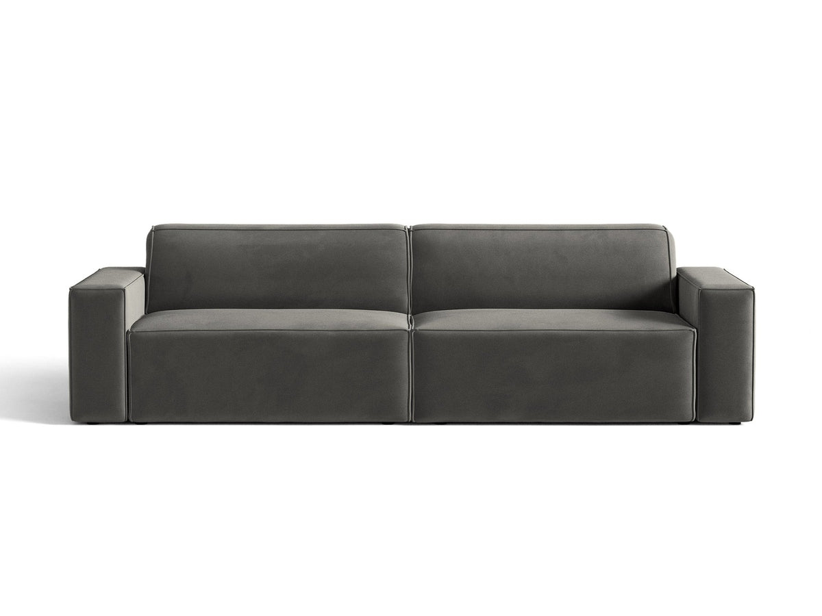 Modulares 4er Sofa Jodie von Micadoni in leichtem Beige mit Venus Samtstoff, schwarzen Kunststoffbeinen und niedriger Rückenlehne.