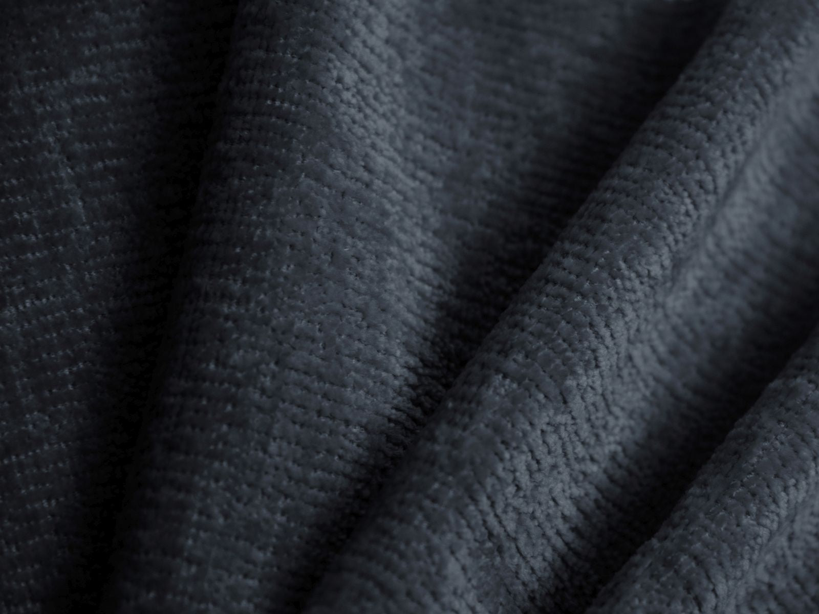 Stylischer 1-Sitzer Sessel Tove in tiefem Blau, perfekt für stilvolle Wohnräume und entspannte Auszeiten von Micadoni.
