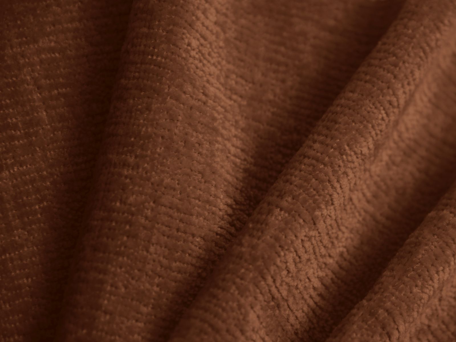 Stylischer 1-Sitzer Sessel Tove in ansprechendem Terracotta, perfekt für gemütliche Leseecken und modernes Wohndesign.