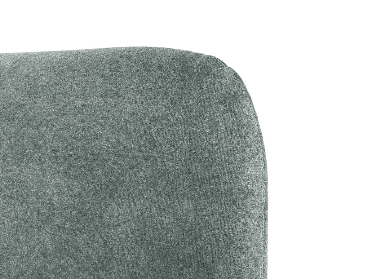 Foto des Vera Betts mit gepolstertem, abgerundetem Kopfteil in leichtem Beige, Chenille-Stoff und gepolsterten Holzbeinen.