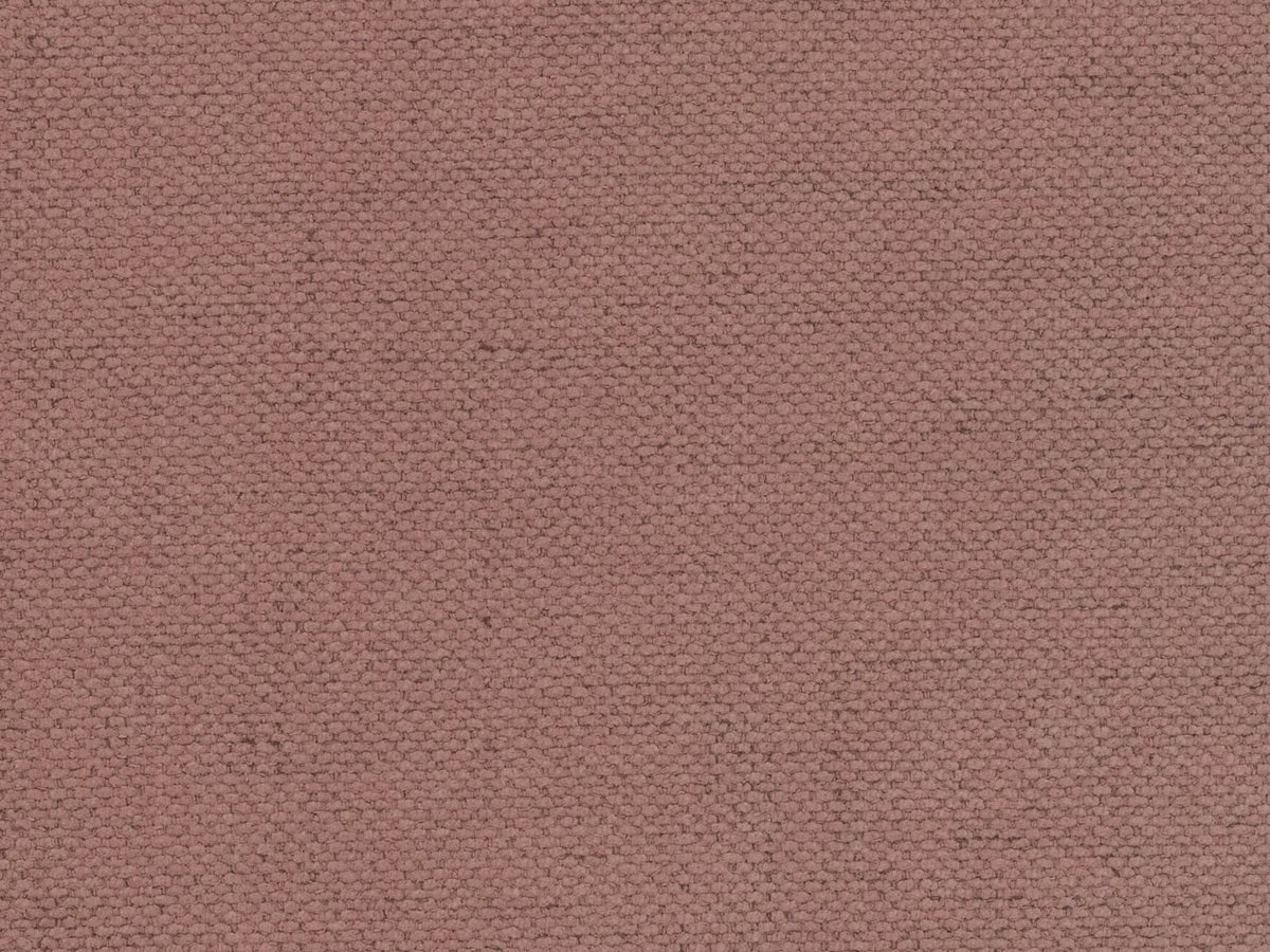 Flaschengrünes Boucle-Bett mit Stauraumkasten, gepolstertem Kopfteil und schwarzen Metallbeinen, Frontalansicht im Schlafzimmer.