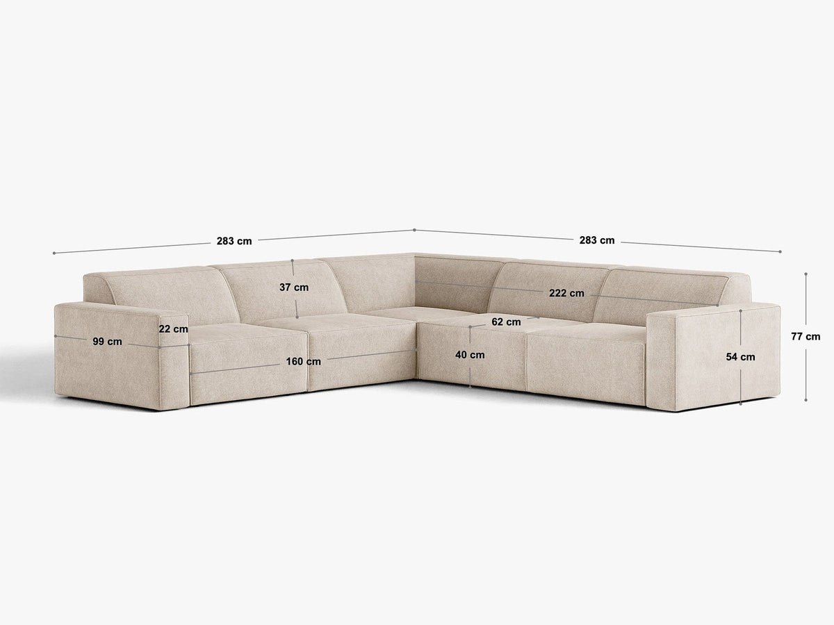 Symmetrisches modulares Ecksofa Jodie von Micadoni in leichtem Beige mit Venus-Samtstoff und schwarzen Kunststoffbeinen, Eckform.