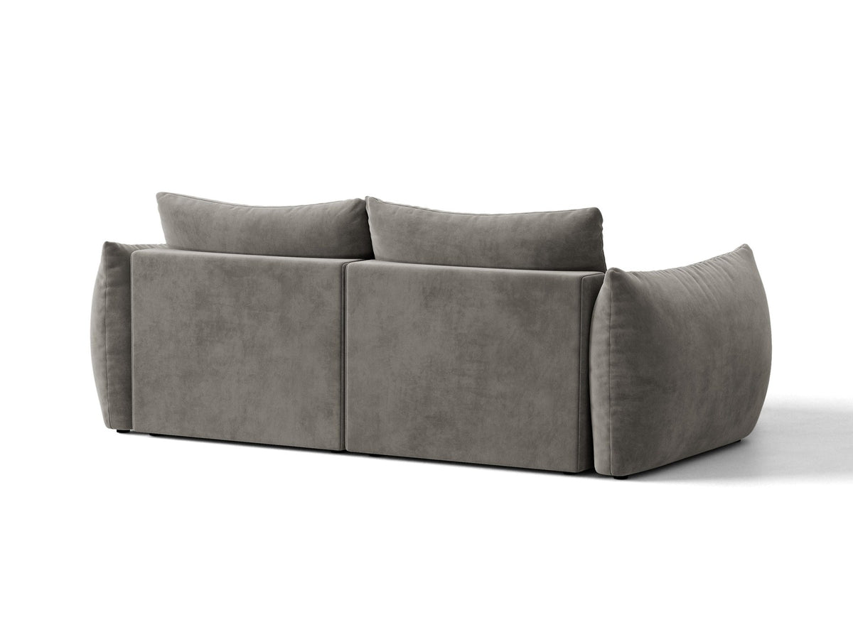 Ecksofa Bloom in Sand mit Velours-Bezug, schwarzen Kunststoffbeinen und ausklappbarer Schlaffunktion samt Bettkasten unter der Sitzfläche.