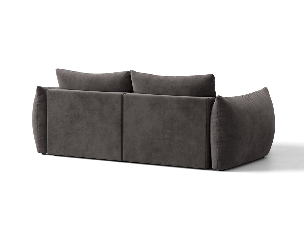 Ecksofa Bloom in Sand mit Velours-Bezug, schwarzen Kunststoffbeinen und ausklappbarer Schlaffunktion samt Bettkasten unter der Sitzfläche.