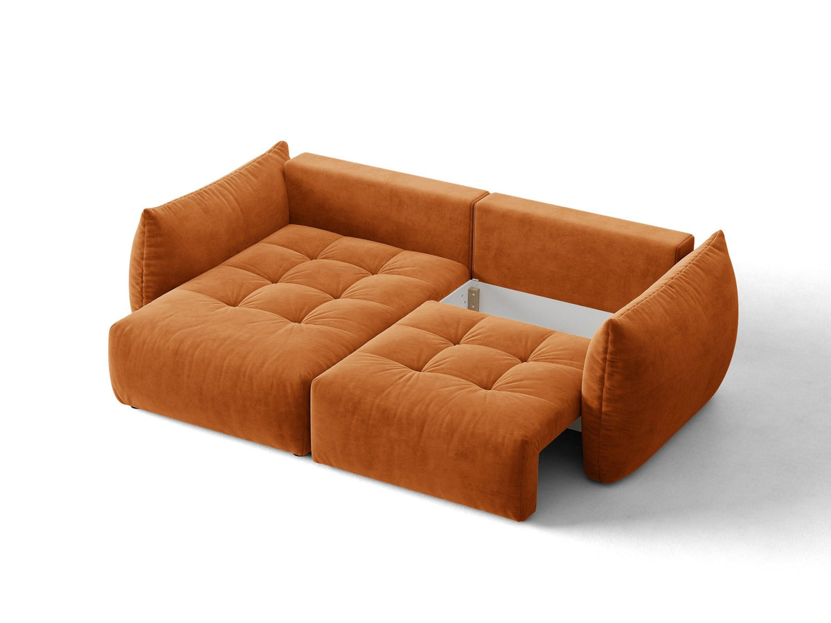 Ecksofa Bloom in Sand mit Velours-Bezug, schwarzen Kunststoffbeinen und ausklappbarer Schlaffunktion samt Bettkasten unter der Sitzfläche.
