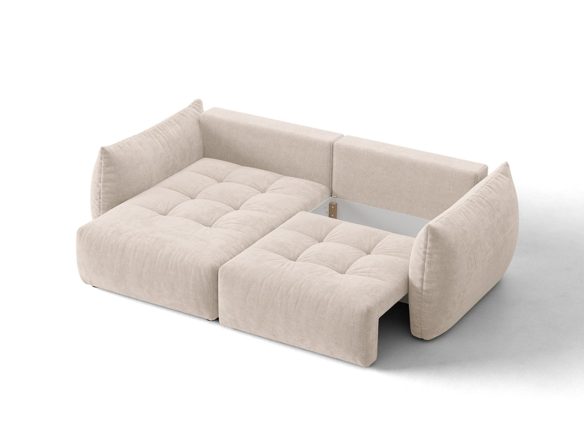 Ecksofa Bloom in Sand mit Velours-Bezug, schwarzen Kunststoffbeinen und ausklappbarer Schlaffunktion samt Bettkasten unter der Sitzfläche.