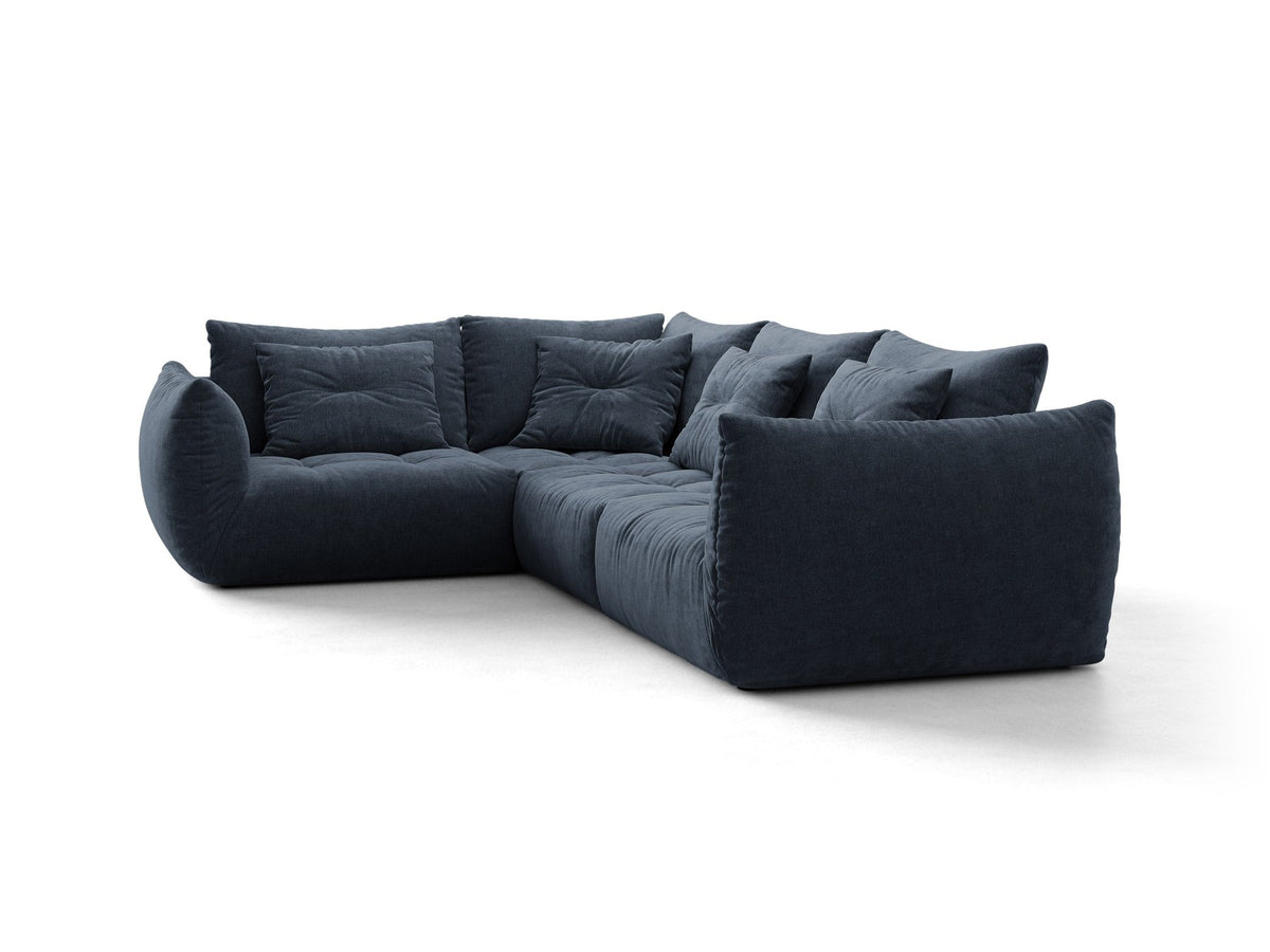 Modulares Ecksofa links Bloom von Micadoni in leichtem Beige, Veloursstoff Casino Pearl, schwarze Kunststoffbeine, tiefe Sitzfläche.