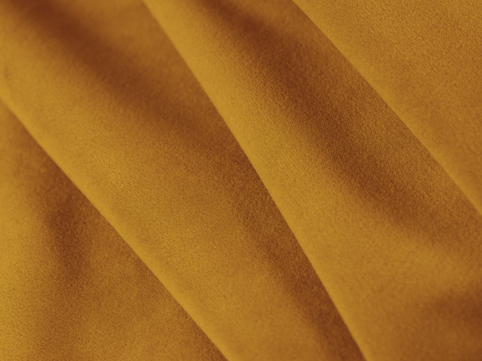 Elegantes Deko Kissen Dreamy in warmen Gelbtönen, perfekt für einladende Wohnambiente. Hochwertige Materialien von Micadoni.
