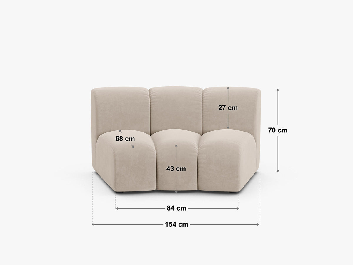 Armloses Sofamodul Lupine von Micadoni in leichtem Beige mit Samtbezug Venus, schwarzen Kunststoffbeinen und gepolsterter Rückenlehne.