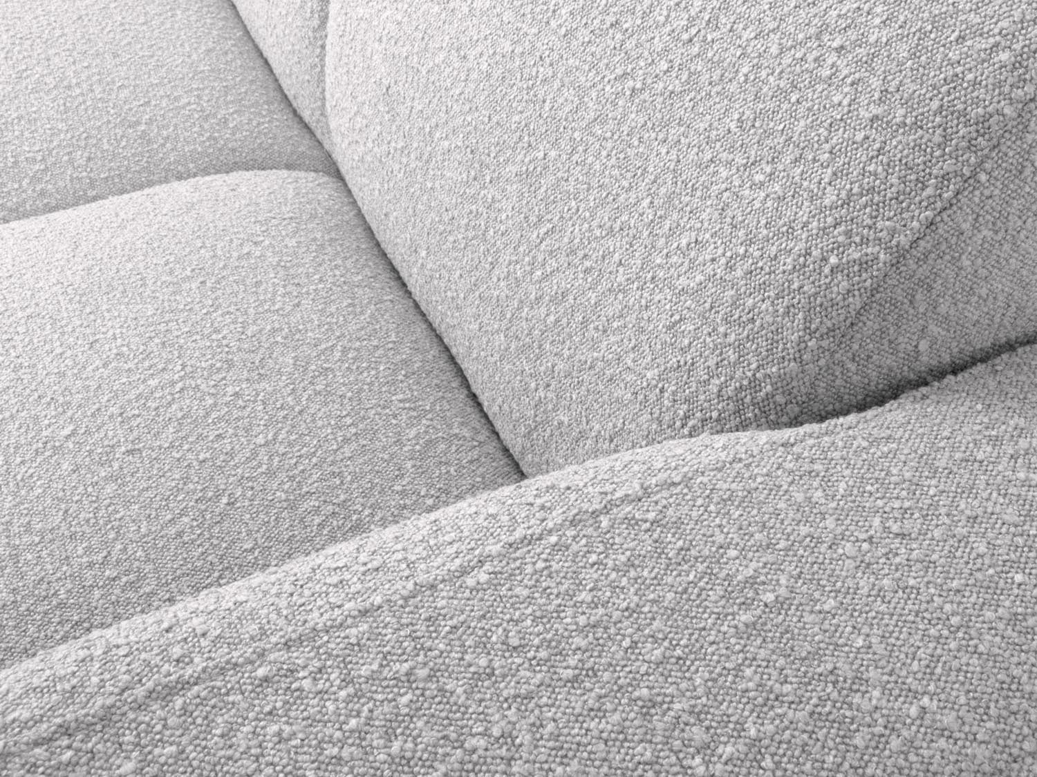 Molino Boucle Ecksofa rechts 4 Sitzer in Light Grey präsentiert im Onlineshop von KAQTU Design AG. Ecksofa rechts ist von Micadoni
