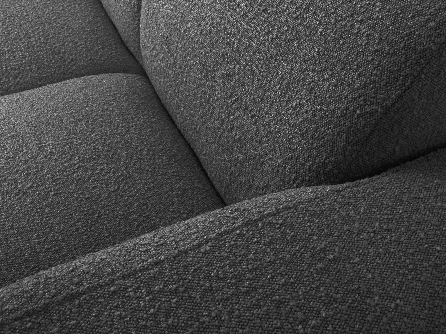 Molino Boucle Ecksofa rechts 4 Sitzer in Dark Grey präsentiert im Onlineshop von KAQTU Design AG. Ecksofa rechts ist von Micadoni