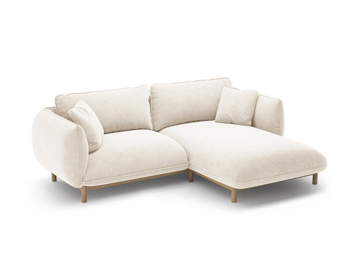 Foto des Ada Linkes Ecksofa von Micadoni in Mandel beige: L-Sofa mit rundem Armlehnen-Design, Buchenholzbeinen und Velours-Bezug Casino Lion.