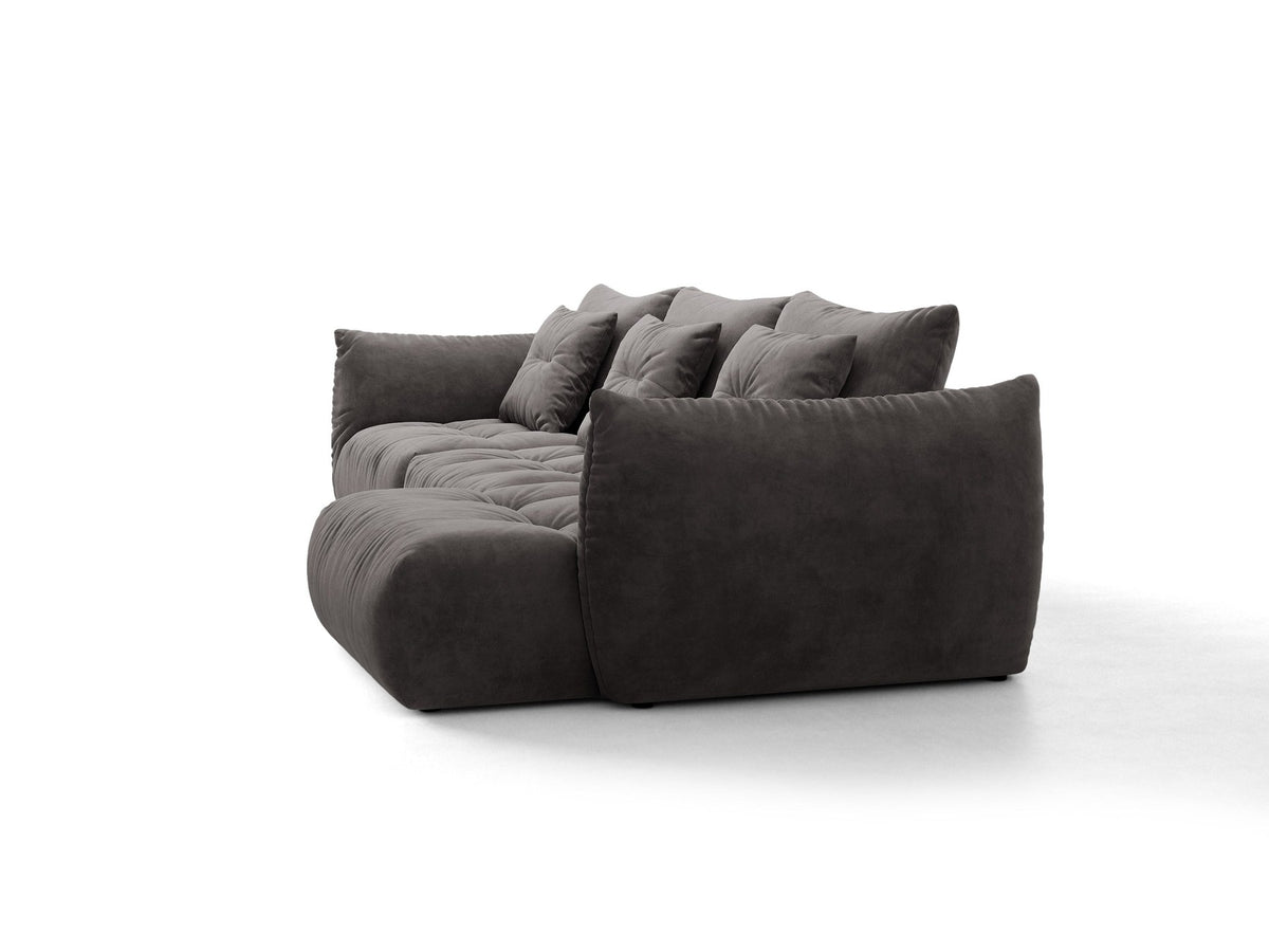 Beiges L-Sofa rechts Bloom von Micadoni mit Veloursstoff-Bezug Casino Pearl, schwarzen Kunststoffbeinen und sichtbarem Staufach unter der Sitzfläche.