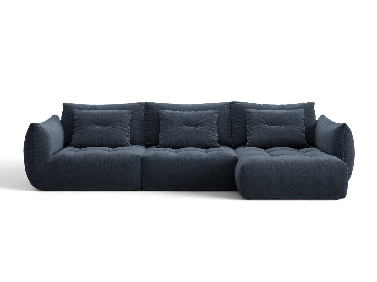 Beiges L-Sofa rechts Bloom von Micadoni mit Veloursstoff-Bezug Casino Pearl, schwarzen Kunststoffbeinen und sichtbarem Staufach unter der Sitzfläche.