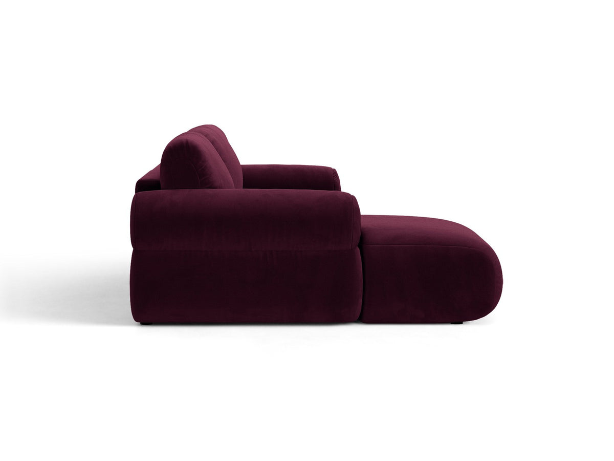 Beiges L-Ecksofa Ophelia von Micadoni mit Stoffbezug Liberty, schwarzen Kunststoffbeinen und niedriger, abgerundeter Sitzform.