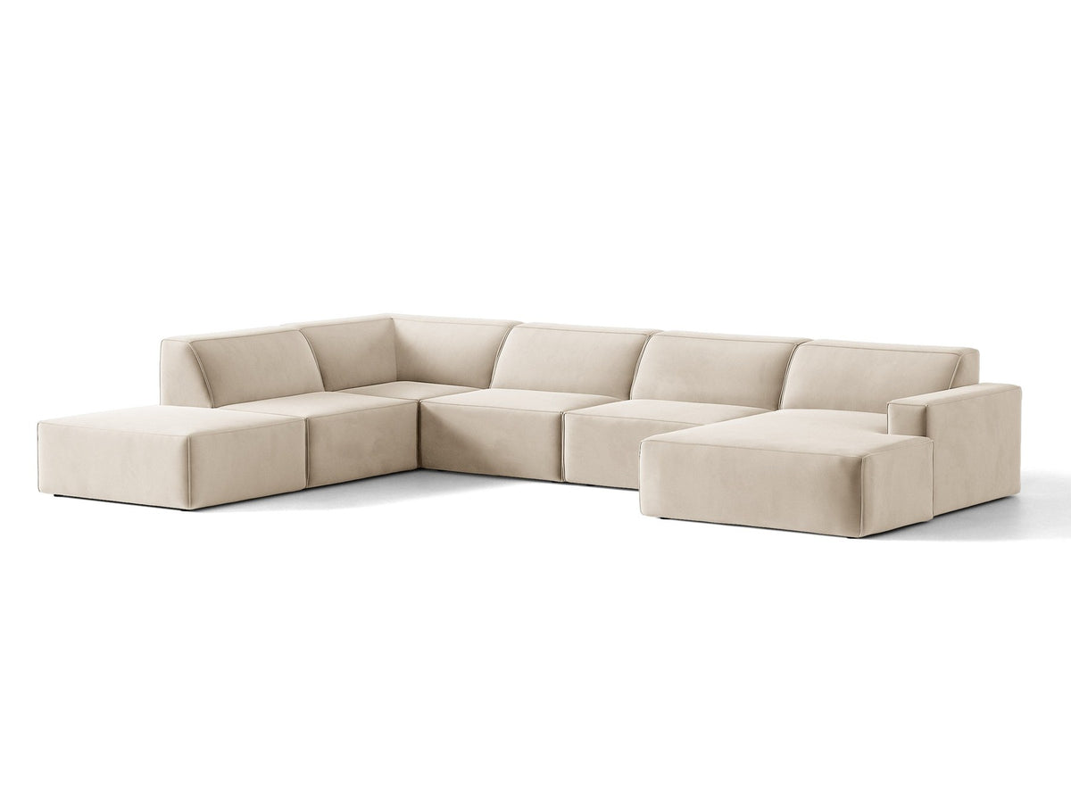 Modulares Ecksofa links Jodie von Micadoni in leichtem Beige mit Venus-Samtstoff, schwarzen Kunststoffbeinen und Panoramaform.